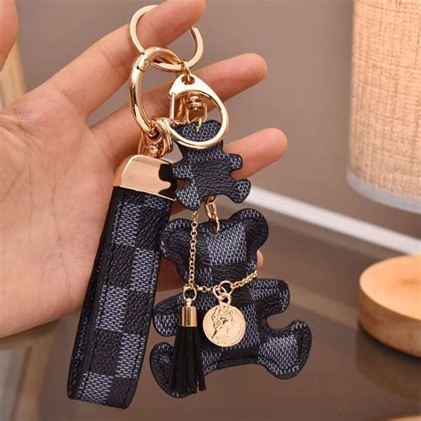 louis vuitton leather dog keychain|louis vuitton teddy bear keychain.